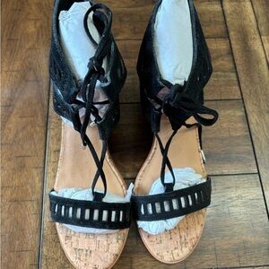 UV Brand new in box, healed sandals size 8, 3 1/2 heel. Black leather lace up